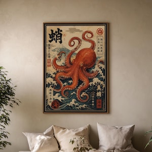 May include: A rectangular wall art print featuring a large orange octopus centered over dark blue crashing waves and a distant mountain. The design includes black Japanese kanji characters, red circular stamps, and a cream-colored background.
