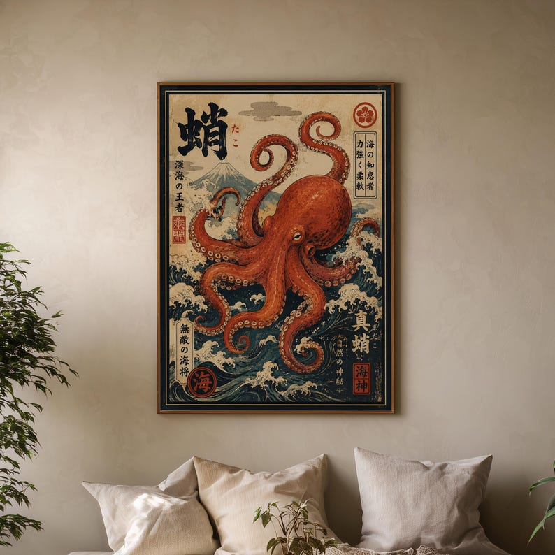 May include: A rectangular wall art print featuring a large orange octopus centered over dark blue crashing waves and a distant mountain. The design includes black Japanese kanji characters, red circular stamps, and a cream-colored background.