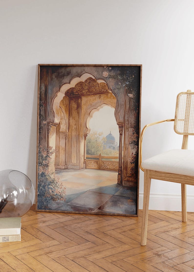 May include: A framed painting of an arched doorway with a view of a building in the distance. The painting is in a muted color palette of browns, greens, and blues.