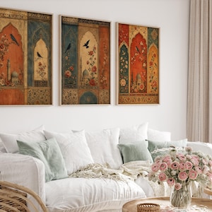 May include: Three framed wall art pieces with an antique aesthetic. Each panel features a central arch design with a bird, floral elements, and a mosque-like structure. The color palette includes shades of red, blue, and gold.