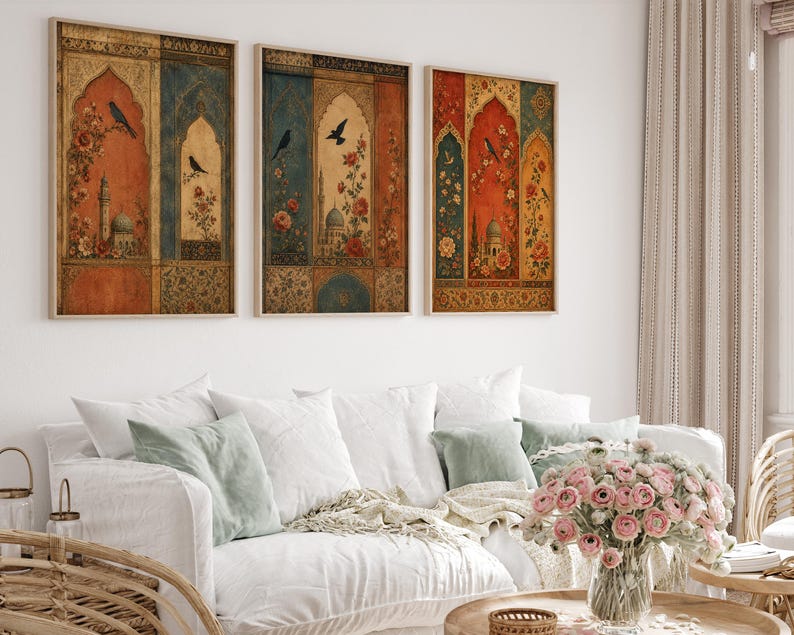 May include: Three framed wall art pieces with an antique aesthetic. Each panel features a central arch design with a bird, floral elements, and a mosque-like structure. The color palette includes shades of red, blue, and gold.