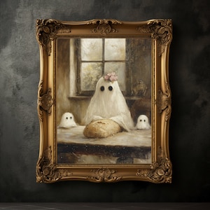 May include: A painting in a gold frame depicts three ghosts, one with a flower crown, sitting at a table with a loaf of bread. The painting has a vintage aesthetic.