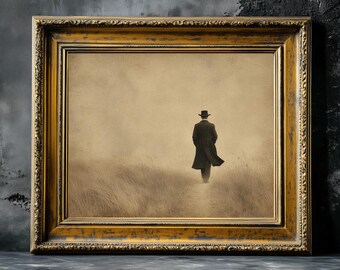 May include: A framed artwork featuring a sepia-toned image of a person in a long coat and hat walking away in a field. The artwork is in a gold ornate frame, set against a dark gray textured background.