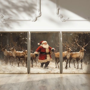 May include: A set of three framed canvas prints depicting a winter scene with Santa Claus and reindeer. The prints are in a rustic style with a brown background and white snow. Santa Claus is wearing a red suit and a white beard, and he is holding a bag of gifts. The reindeer are pulling a sleigh.