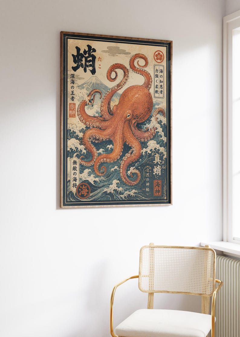 May include: A rectangular framed wall art print featuring a large orange octopus centered over dark blue stylized ocean waves. In the background, a mountain peak is visible. The print includes black Japanese kanji text and red circular stamps.