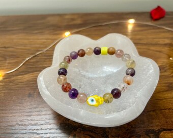 Yellow evil eye bracelet- Quartz - Rutilated Quartz - protection - deflect negative energy - crystal healing - unique