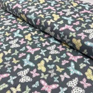 Butterfly Folly Fabric: Multi-Coloured Butterflies on Charcoal - Michael Miller