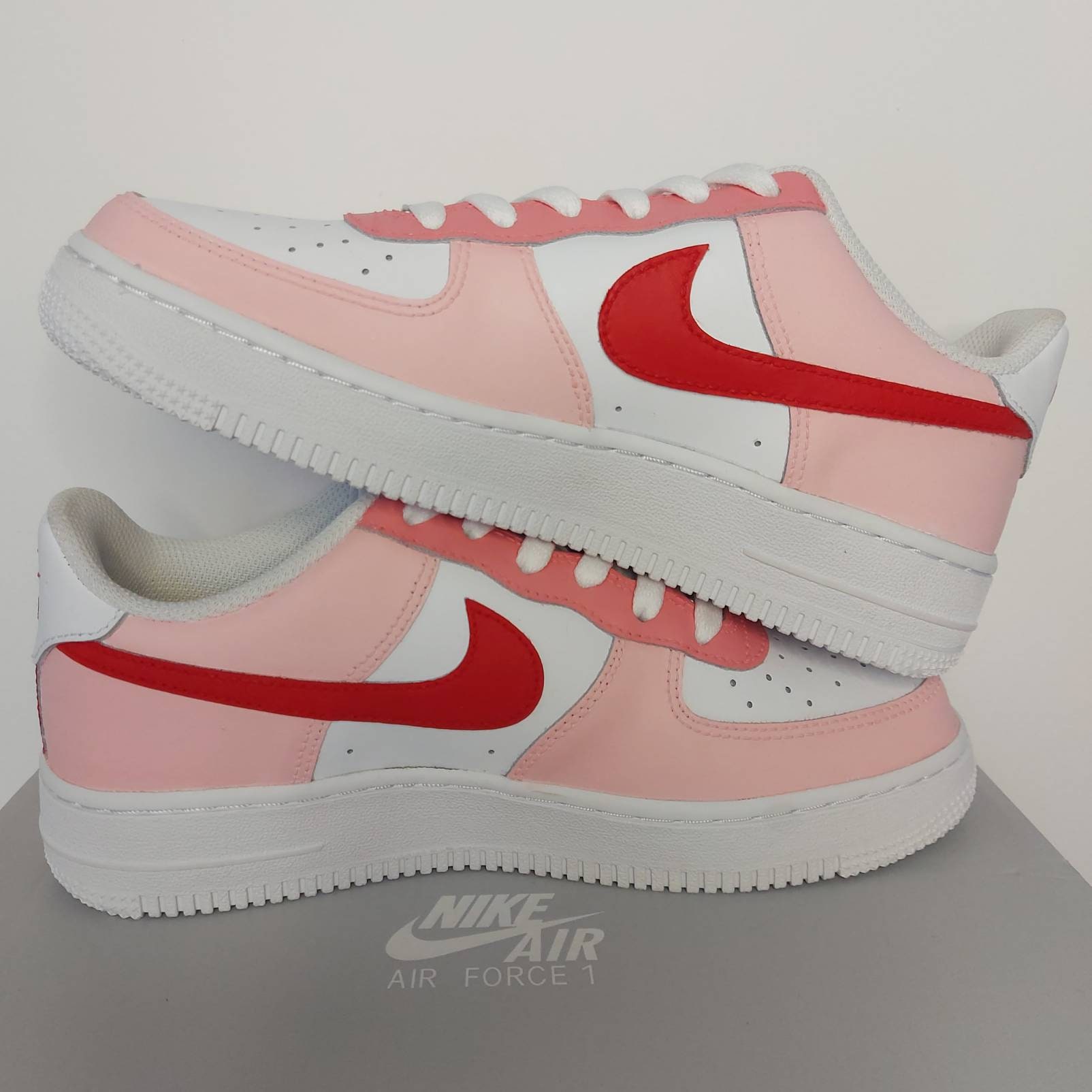 white pink and red air force 1