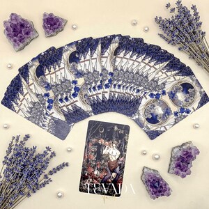 The Radiant Essence Tarot Deck featuring vintage manga Greek mythology art for intuitive divination.