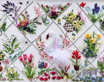 May include: A detailed textile art piece featuring various embroidered flowers, including tulips, daffodils, and lavender, arranged in a grid pattern. A central swan figure is adorned with sequins and feathers. The artwork showcases a variety of colors and textures.