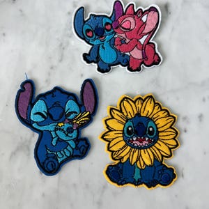 Leuke set opstrijkpatches – geborduurde alien-, zonnebloem-, engel- en leliepatches | Op Disney geïnspireerd opstrijkbaar voor jassen, rugzakken en doe-het-zelvers