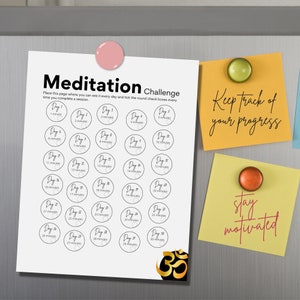 May include: A printable meditation challenge chart with 30 days of increasing meditation times. The chart is printed on white paper and has a pink magnet on the top. There are two yellow sticky notes with the text "Keep track of your progress" and "stay motivated".