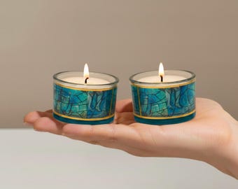 A Pair of Duchin Creation Sterling Silver Weighted Candleholders