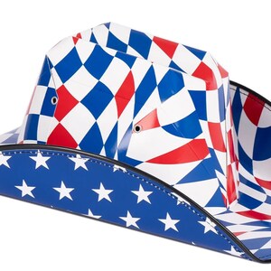 May include: A cowboy hat with a red, white, and blue checkered pattern on the crown and a blue and white American flag pattern on the brim.