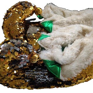 May include: Gold and black sequined elf shoes with white fur trim and green ribbon accents.