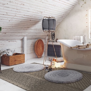 May include: A white bathroom with a clawfoot tub, a wooden crate, and a rug. The bathroom has a rustic, farmhouse style.