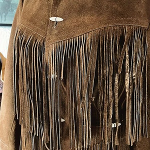 Unique button closure with eye and loop style
