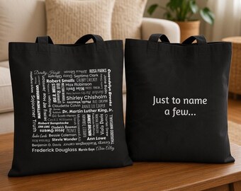 May include: Two black tote bags. The left bag features a white square graphic containing a list of names including Rosa Parks, Dr. Martin Luther King, Jr., and Frederick Douglass. The right bag displays the white text Just to name a few...