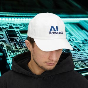 May include: White baseball cap with the text "AI POWERED" in blue. The cap is made of a soft material and has a curved brim. The background features a circuit board design.