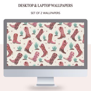 May include: A computer screen displaying a digital wallpaper pattern of pink cowboy boots with floral designs on a cream background. The text "DESKTOP & LAPTOP WALLPAPERS" and "SET OF 2 WALLPAPERS" is displayed at the top of the screen.