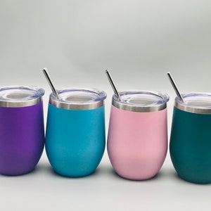 May include: Four stainless steel wine tumblers with lids and straws. The tumblers are purple, blue, pink, and green.
