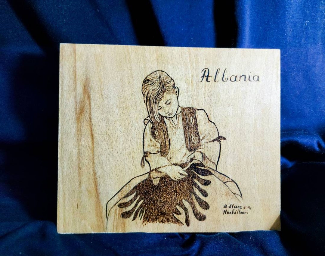 Albanian Art Girl Sewing the Albanian Flag. Wood Burning Traditional ...