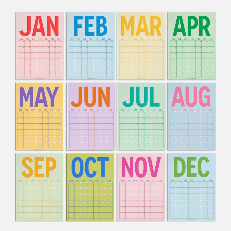 May include: A colorful calendar with each month displayed in a separate square. The months are labeled in large, bold letters with each month having a different color. The calendar is designed in a retro style.