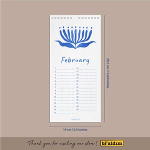 May include: A white wall calendar for February, featuring a blue floral design and the month's name. The calendar measures 11.69 inches tall and 5.5 inches wide. The calendar includes dates from 1 to 29.