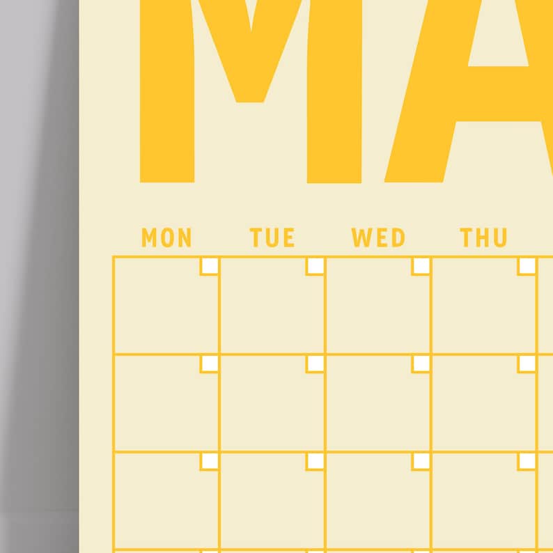 May include: A yellow calendar with the word "MAY" at the top and a grid of squares for each day of the month. The days of the week are labeled "MON", "TUE", "WED", and "THU".