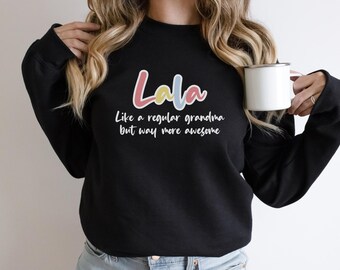 May include: Black sweatshirt with the text "Lala Like a regular grandma but way more awesome" in colorful letters.