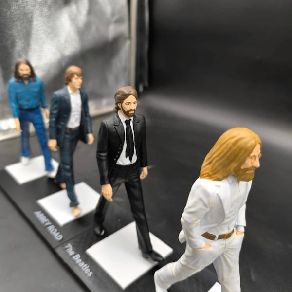 De fantastische vier, de Beatles, actiefiguren van Abbey Road