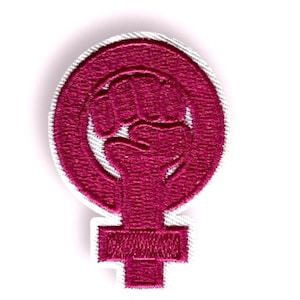 May include: Pink embroidered patch with a raised fist inside a circle, and a female symbol below the circle.