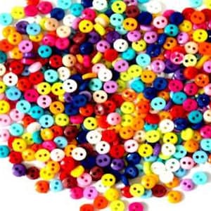 May include: A large assortment of colourful plastic buttons with two holes each. The buttons are in various shades of red, orange, yellow, green, blue, purple, and white.
