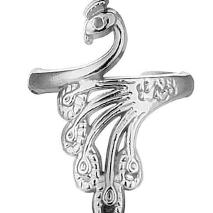 May include: Silver peacock ring with an intricate design. The ring is open and adjustable to fit most finger sizes.