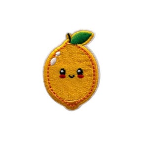 May include: An embroidered lemon with a green leaf and a smiling face. The lemon is yellow with a stitched outline and red cheeks.