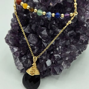 Black Onyx and Chakra Gold Pendant