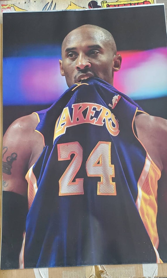kobe bryant biting jersey