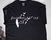 Indigenous Decolonization Club Graphic Tee With Divinely Misunderstood Side Arm