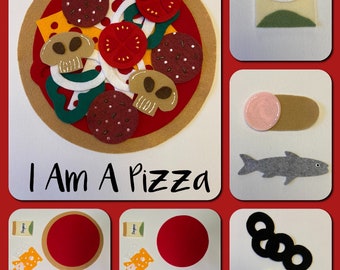 May include: Felt pizza craft set with a red pizza base, toppings like mushrooms, pepperoni, cheese, and green peppers, and a small bag of oregano. The set also includes a felt fish, black olives, and yellow peppers. The text "I Am A Pizza" is written below the pizza.