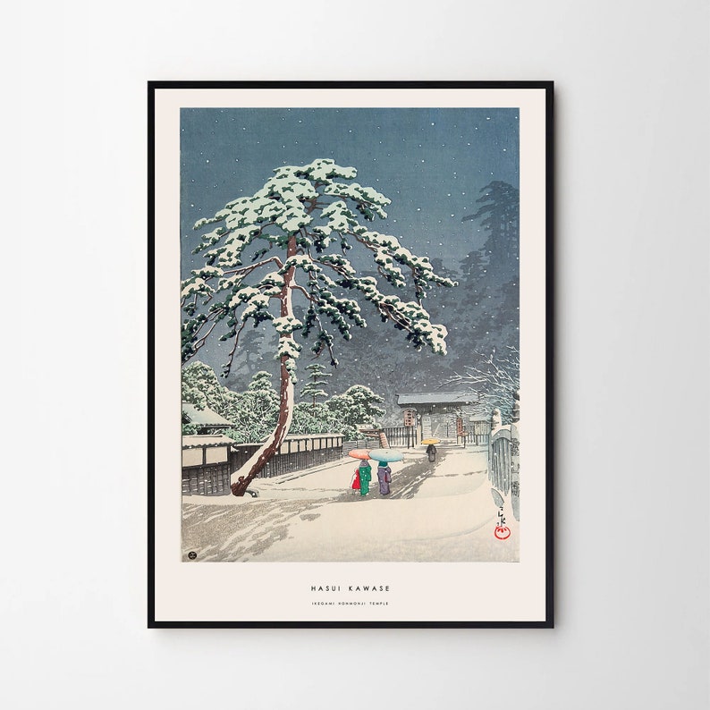 May include: A woodblock print of a snowy scene in Japan. A large pine tree covered in snow stands in the foreground, with a path leading to a gate. Two figures walk along the path, carrying umbrellas. The print is titled "Hasui Kawase" and "Todaiji Konpon-Daito Temple".