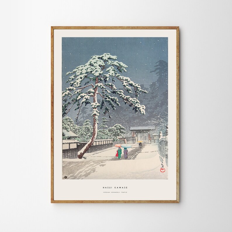 May include: A woodblock print of a snowy Japanese landscape with a large pine tree covered in snow. Two figures walk along a path towards a gate with a red stamp in the lower right corner. The text at the bottom reads "Hasui Kawase" and "Snow Scene, Oji Temple".
