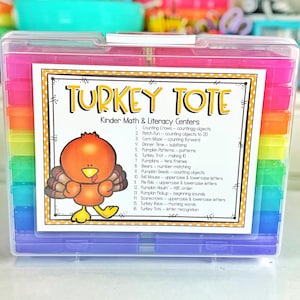 May include: A clear plastic tote with a colorful rainbow of compartments. The tote is labeled "TURKEY TOTE" and lists "Kinder Math & Literacy Centers" with 16 different activities for children.