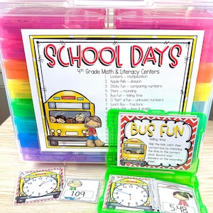 May include: A clear plastic storage container filled with colorful dividers, labeled "SCHOOL DAYS." The container includes cards for math and literacy centers, with a bus theme. Cards show clocks and times like 1:09 and 5:48, designed for telling time practice.