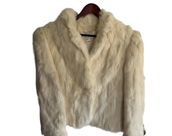 Vintage women's cream colored fur coat