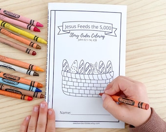 May include: A black and white colouring page featuring a basket of bread and fish. The title of the page is "Jesus Feeds the 5,000 Story Order Colouring" with the scripture reference "John 6:1-14, ICB".