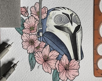 May include: A black and white illustration of a Mandalorian helmet with a blue visor, surrounded by pink cherry blossoms. The helmet has a white stripe down the center and a black stripe on the side.