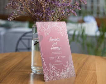 May include: A pink wedding invitation with white floral designs and the text "Jemima and Harry" with the date "Wednesday 13 September 2022" and the time "3:15 PM".