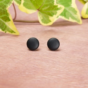 Black matte round stud earrings. 1 cm neutral minimalist dot studs with surgical stainless steel posts without glue.
