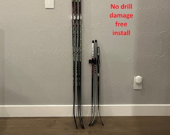 MINI Hockey Stick Wall Holder [3 sticks, 4 sticks, 5, 6, 7] fits Mini, Mystery, & Knee Hockey Sticks. Self adhesive. Organize hockey gear