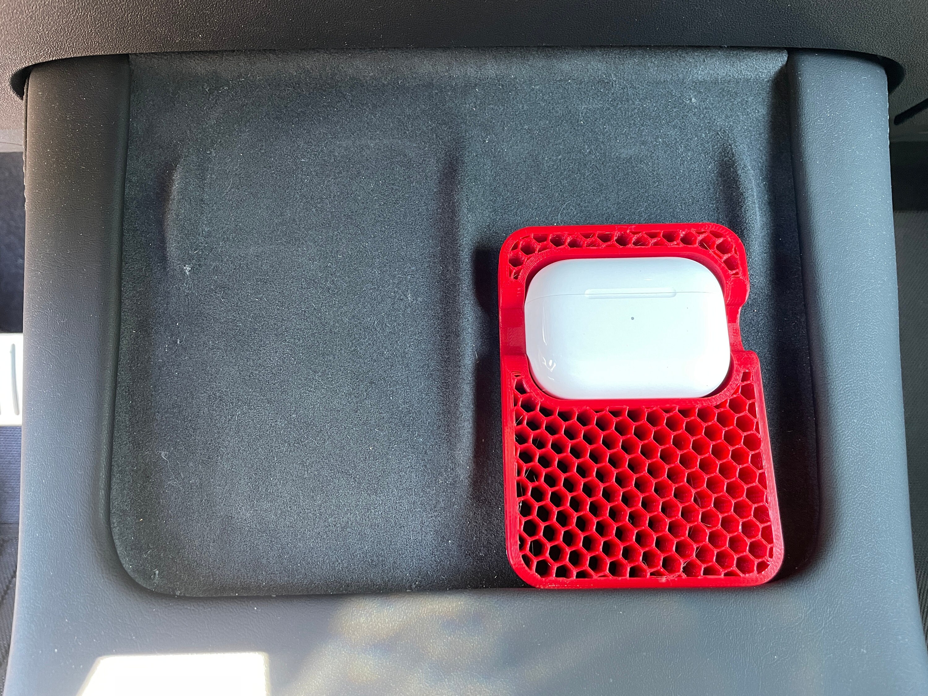 AirPods holder for the inductive charging cradle in the Tesla with OOONO  mounting option